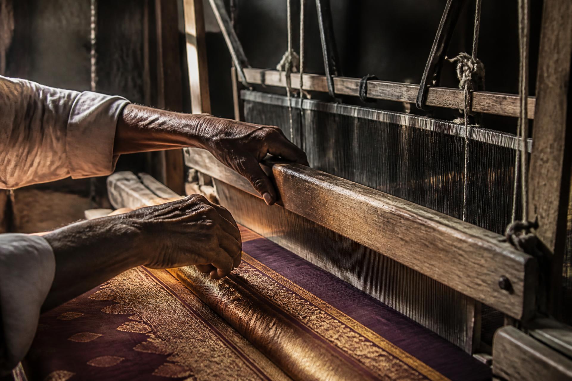 An artisan's hands at the loom