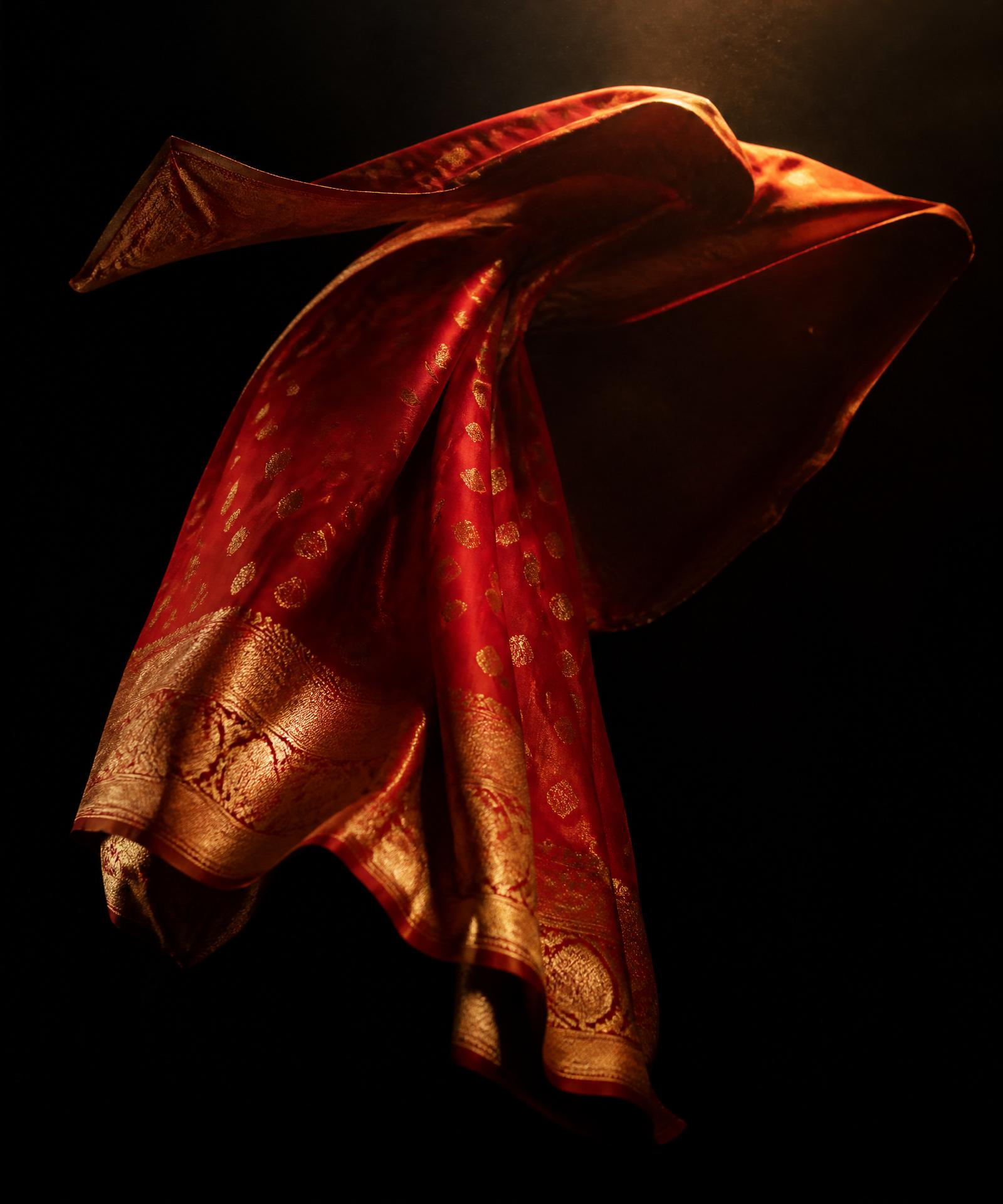 Silk saree unfolding in mid-air